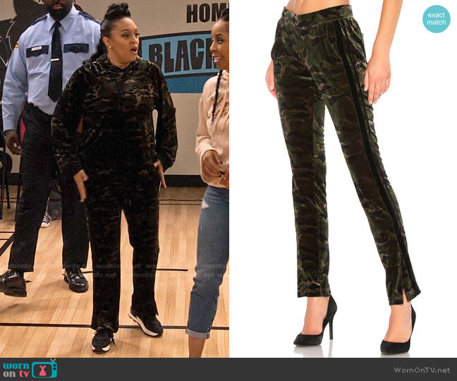 Pam & Gela Side Slit Velvet Track Pant worn by Cocoa McKellan (Tia Mowry-Hardrict) on Family Reunion