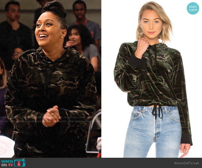 Pam & Gela Velvet Crop Hoodie worn by Cocoa McKellan (Tia Mowry-Hardrict) on Family Reunion