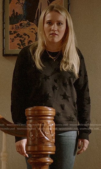 Roxy’s star and heart print sweater on Almost Family