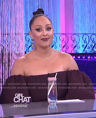 Tamera’s purple off-shoulder puff sleeve dress on The Real