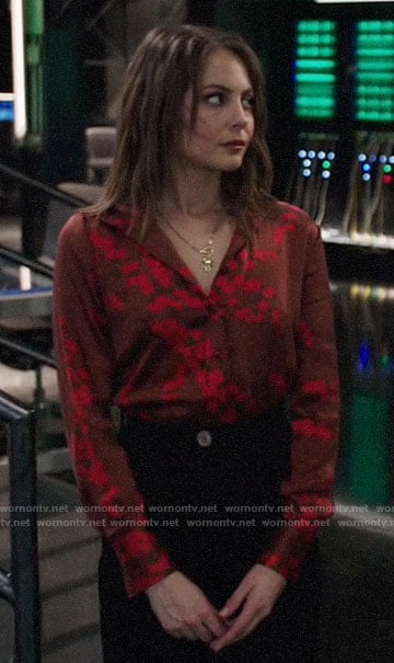 Thea’s red floral button down blouse on Arrow