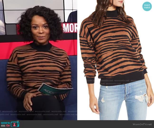 WAYF Vincent Tiger Print Mock Neck Sweater worn by Zuri Hall on Access Hollywood