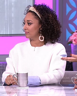 Tamera’s white ribbed sweater with cutouts on The Real