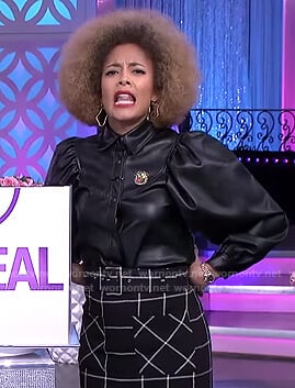 Amanda’s black puff sleeve jacket and check skirt on The Real