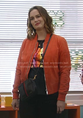 Angie’s black graphic print tee on Single Parents