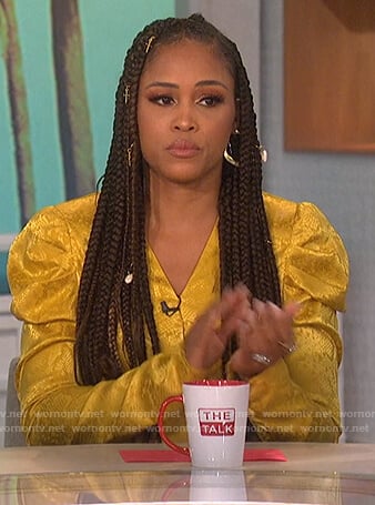 Eve’s yellow snakeskin bodysuit on The Talk