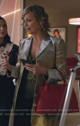Jacqueline’s metallic pleated top and coat on The Bold Type