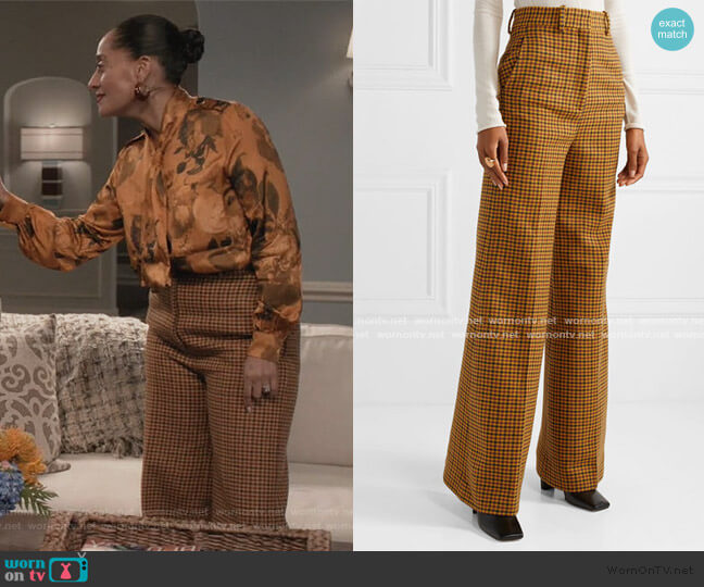 Khaite Bernadette checked wool wide-leg pants worn by Rainbow Johnson (Tracee Ellis Ross) on Black-ish