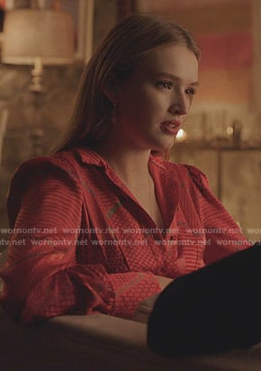 Kirby’s red printed shirtdress on Dynasty