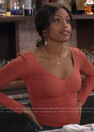 Ali’s orange ruched front top on God Friended Me