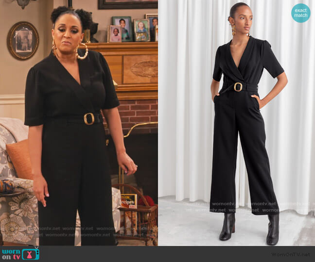 & Other Stories Belted Plunging Jumpsuit worn by Cocoa McKellan (Tia Mowry-Hardrict) on Family Reunion