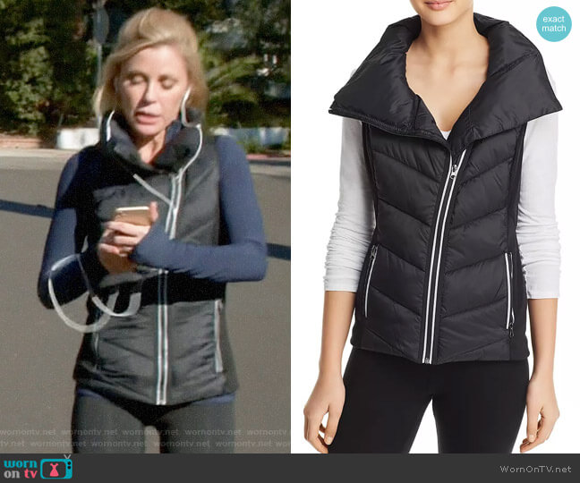 Aqua Asymmetric Puffer Vest worn by Claire Dunphy (Julie Bowen) on Modern Family