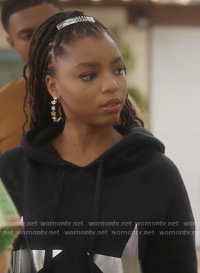 Jazlyn’s black star print sweaterdress on Grown-ish