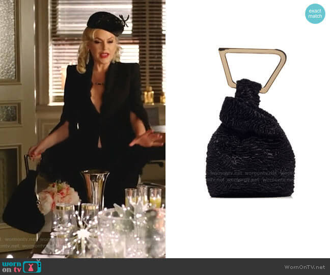 Cult Gaia Astraea Faux Fur Top Handle Bag worn by Alexis Carrington (Elaine Hendrix) on Dynasty