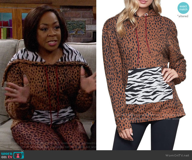 Good American Mixed Animal Hoodie worn by Tina Butler (Tichina Arnold) on The Neighborhood
