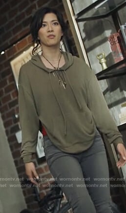 Grace’s green hoodie with back cutout on Black Lightning