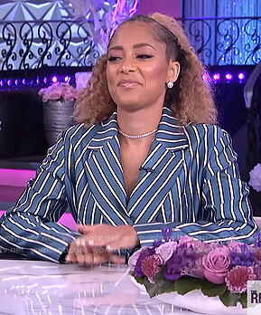Amanda’s green stripe satin blazer and pants on on The Real
