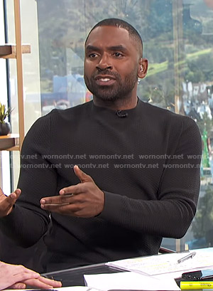 Justin’s black diamond knit sweater on E! News Daily Pop