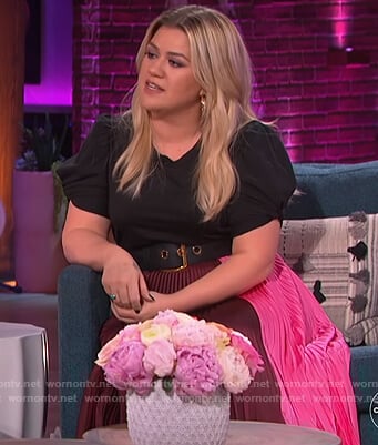Kelly’s pleated skirt and black puff sleeve top on The Kelly Clarkson Show