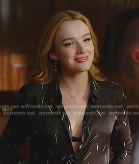 Kirby’s black matchstick print blouse on Dynasty