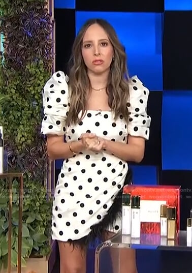 Lilliana’s white polka dot puff-sleeve mini dress on E! News