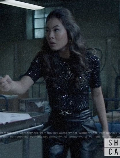Mary’s black rhinestone studded top on Batwoman