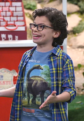 Matteo’s blue dinosaur print tee and plaid shirt on Bunkd