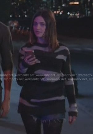 Olive’s distressed camo sweater on Manifest