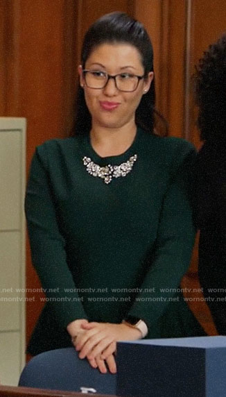 Sherri’s dark green embellished peplum sweater on All Rise