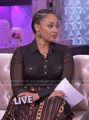 Tamera’s black mesh button down top and chain print skirt on The Real