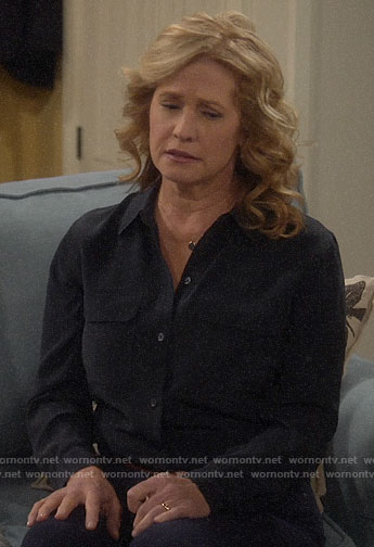 Vanessa’s black button down blouse on Last Man Standing