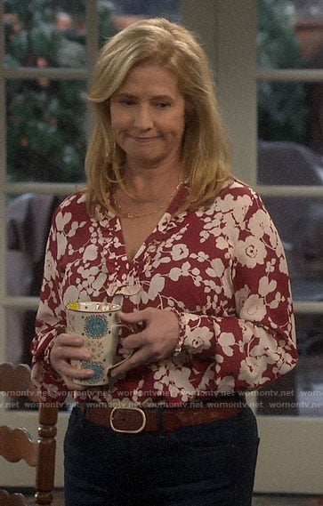 Vanessa’s red floral v-neck blouse on Last Man Standing