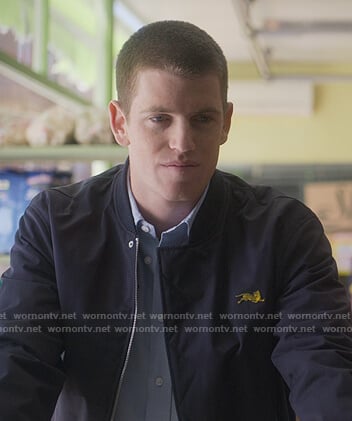 Guzman’s tiger embroidered navy bomber jacket on Elite