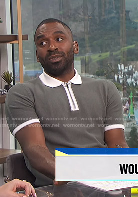 Justin’s grey zipper polo shirt on E! News Daily Pop