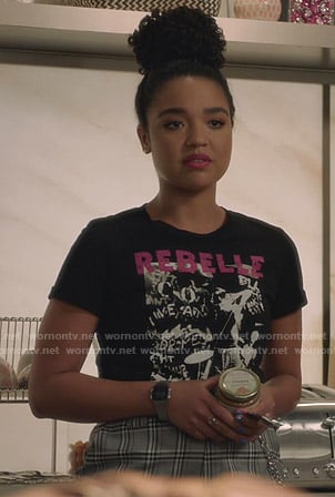Kat’s black Rebelle print tee and grey plaid pants on The Bold Type