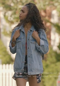Olivia’s studded denim jacket and floral shorts on All American