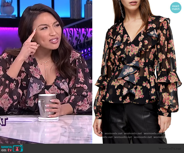 Topshop Floral Print Ruffle Blouse worn by Jeannie Mai on The Real