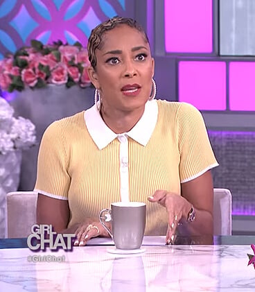 Amanda’s yellow polo and check skirt on The Real