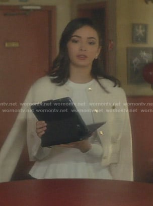 Bess’s white jacket and heart earrings on Nancy Drew