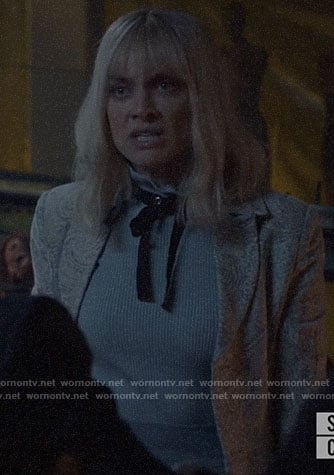 Beth’s blue sweater with studded neck tie on Batwoman