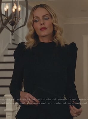 Laura’s black ruffle top on All American