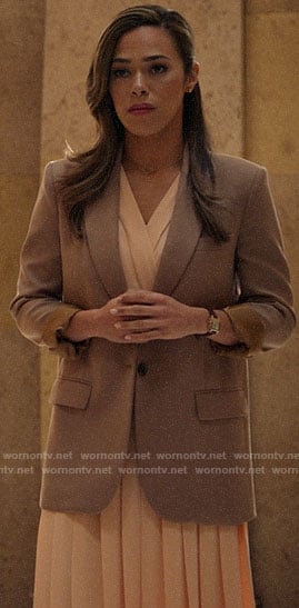 Emily’s coral pleated dress and camel blazer on All Rise