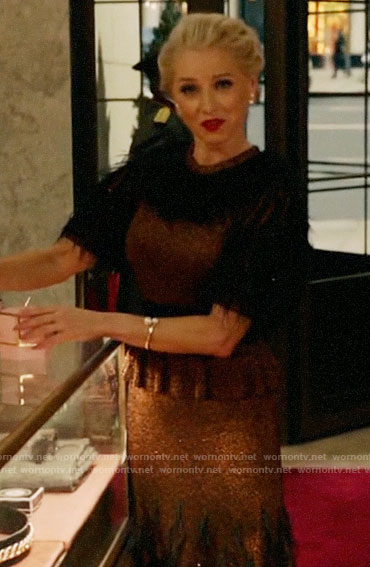 Gloria’s metallic feather detail dress on Katy Keene