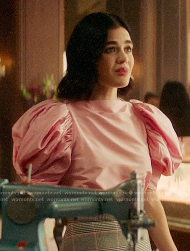 Katy’s pink puff sleeve top and plaid skirt on Katy Keene