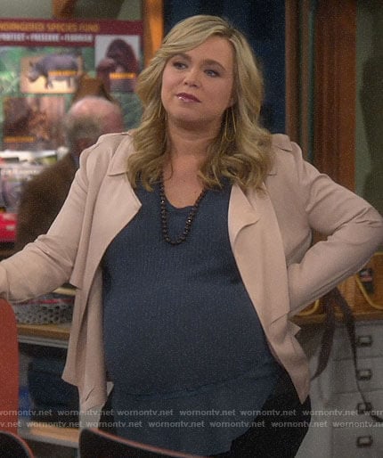 Kristin’s teal blue textured top on Last Man Standing