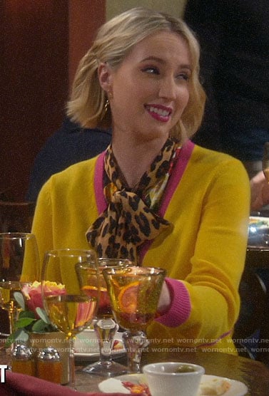 Mandy’s yellow cardigan with pink trim and leopard blouse on Last Man Standing