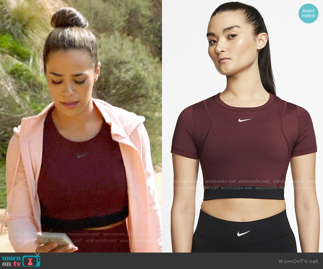 Nike Pro AeroAdapt Crop Top in Maroon worn by Emily Lopez (Jessica Camacho) on All Rise