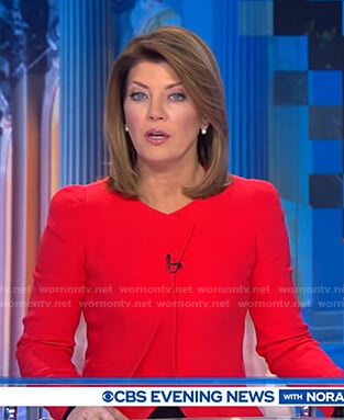 Norah’s red pleated jacket on CBS Evening News