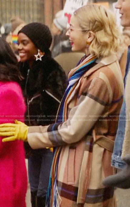 Pepper’s beige plaid coat on Katy Keene