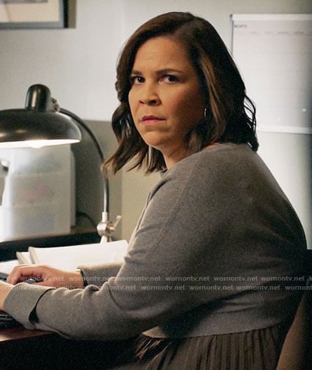 Sara’s grey sweater and pleated dress on All Rise